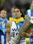 18 May 2011; FC Porto's Falcao, who scored his side's winning goal, celebrates with the UEFA Europa League trophy. UEFA Europa League Final, FC Porto v SC Braga, Dublin Arena, Lansdowne Road, Dublin. Picture credit: Brian Lawless / SPORTSFILE