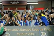 18 May 2011; FC Porto captain Helton lifts the UEFA Europa League trophy alongside his team-mates. UEFA Europa League Final, FC Porto v SC Braga, Dublin Arena, Lansdowne Road, Dublin. Picture credit: Brian Lawless / SPORTSFILE