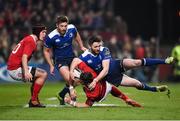 26 December 2016; Darren Sweetnam of Munster is tackled by Barry Daly of Leinster during the Guinness PRO12 Round 11 match between Munster and Leinster at Thomond Park in Limerick. Photo by Diarmuid Greene/Sportsfile