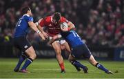 26 December 2016; Jaco Taute of Munster is tackled by Robbie Henshaw, left, and Rory O'Loughlin of Leinster during the Guinness PRO12 Round 11 match between Munster and Leinster at Thomond Park in Limerick. Photo by Brendan Moran/Sportsfile