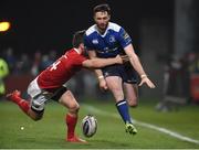 26 December 2016; Barry Daly of Leinster is tackled by Darren Sweetnam of Munster during the Guinness PRO12 Round 11 match between Munster and Leinster at Thomond Park in Limerick. Photo by Diarmuid Greene/Sportsfile