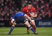 26 December 2016; CJ Stander of Munster takes on Rory O'Loughlin of Leinster during the Guinness PRO12 Round 11 match between Munster and Leinster at Thomond Park in Limerick. Photo by Brendan Moran/Sportsfile