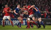 26 December Jean Kleyn of Munster is tackled by Cian Healy of Leinster during the Guinness PRO12 Round 11 match between Munster and Leinster at Thomond Park in Limerick. Photo by Brendan Moran/Sportsfile
