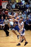 25 January 2002; Mike Keohane of Waterford Crystal in action against Scott Summersgill of SX3 Star during the ESB Men's National Cup semi-final between Waterford Crystal and SX3 Star at the ESB Arena in Tallaght, Dublin. Photo by Brian Lawless/Sportsfile