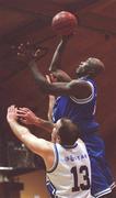 25 January 2002; James Singleton of Waterford Crystal goes up for a basket despite the attentions of John Leahy of SX3 during the ESB Men's National Cup semi-final between Waterford Crystal and SX3 Star at the ESB Arena in Tallaght, Dublin. Photo by Brian Lawless/Sportsfile