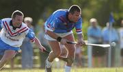 26 January 2002; Diarmuid O'Sullivan of 2000 Eircell GAA All-Stars in action against Kevin Broderick of 2001 Eircell Vodafone GAA All-Stars during the Vodafone All Star tour at the Hurling Club of Argentina in Hurlingham, Buenos Aires, Argentina. Photo by Ray McManus/Sportsfile