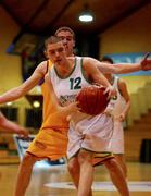 4 February 2002; Niall Mellan of St Malachy's in action against Robert Grant of De La Salle during the Bank of Ireland Schools Cup U-19 A Final between De La Salle College, Waterford and St Malachy's College, Belfast at the ESB Arena in Tallaght, Dublin. Photo by Brendan Moran/Sportsfile