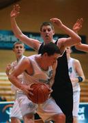 4 February 2002; Eoin McDermott of CBS Naas in action against Naoise O'Ciardha of Belvedre during the Bank of Ireland Schools Cup U-16 B Final between Belvedere College, Dublin and CBS Naas, Kildare at ESB Arena in Tallaght, Dublin. Basketball. Photo by Brendan Moran/Sportsfile