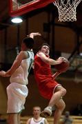 5 February 2002; Shane Melia of St Muredach's in action against Kieran Donaghy of Tralee during the Bank of Ireland Schools Cup U19 B Final between St Muredach's College, Ballina and Tralee Community College at the ESB Arena in Tallaght, Dublin. Photo by Brendan Moran/Sportsfile