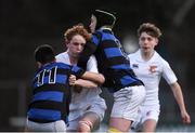 10 January 2017; Adam Kiernan of Presentation College Bray is tackled by Kevin Farrington, right, and Oisin K. Smith of Mount Temple during the Bank of Ireland Fr Godfrey Cup Round 1 match between Presentation College Bray and Mount Temple at Donnybrook Stadium in Donnybrook, Dublin. Photo by Cody Glenn/Sportsfile