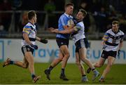 11 January 2017; Ryan Deegan of Dublin in action against UCD's from left, Seán Mullooly, Niall McInerney and Peter Healy during the Bord na Mona O'Byrne Cup Group 1 Round 2 match between Dublin and UCD at Parnell Park in Dublin. Photo by Piaras Ó Mídheach/Sportsfile