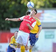 3 June 2011; Ian Daly, St Patrick's Athletic, in action against Derek Griffin, Crumlin United. FAI Ford Cup Third Round, Crumlin United v St Patrick's Athletic, Richmond Park, Inchicore, Dublin. Picture credit: Matt Browne / SPORTSFILE