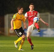 10 June 2011; Ian Bermingham, St Patrick's Athletic, in action against Garrett McGlynn, Derry City. Airtricity League Premier Division, St Patrick's Athletic v Derry City, Richmond Park, Dublin. Picture credit: Stephen McCarthy / SPORTSFILE