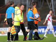 10 June 2011; Sligo Rovers manager Paul Cook has words with referee Damien Hancock at half-time. Airtricity League Premier Division, Bohemians v Sligo Rovers, Dalymount Park, Dublin. Picture credit: Brian Lawless / SPORTSFILE