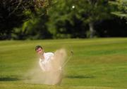 14 June 2011; Cian Arthurs, Swords, Co. Dublin, plays out of the bunker on the 9th during the 2nd Qualifying Round ahead of the 74th World Open One Armed Championships. Co. Meath Golf Club, Newtownmoynagh, Trim, Co. Meath. Picture credit: Pat Murphy / SPORTSFILE