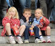 18 June 2011; Dublin supporters Mena Nic Mheanmain, aged five, Liam De Clár, aged four, and Aoibhe  Nic Mheanmain, aged four, enjoy a snack before the game.  Leinster GAA Hurling Senior Championship Semi-Final, Dublin v Galway, O'Connor Park, Tullamore, Co. Offaly. Picture credit: Ray McManus / SPORTSFILE