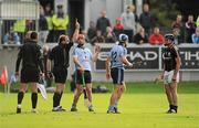 18 June 2011; Referee Michael Wadding after consulting with a linesman, Patrick Murphy, shows a red card to Dublin's Ryan Dwyer. To the right are Conal Keaney, 12, and galkwa's Shane Kavanagh. Leinster GAA Hurling Senior Championship Semi-Final, Dublin v Galway, O'Connor Park, Tullamore, Co. Offaly. Picture credit: Ray McManus / SPORTSFILE
