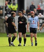 18 June 2011; Referee Michael Wadding consults with a linesman, Patrick Murphy, before showing Dublin's Ryan Dwyer, right, a straight red card. Leinster GAA Hurling Senior Championship Semi-Final, Dublin v Galway, O'Connor Park, Tullamore, Co. Offaly. Picture credit: Ray McManus / SPORTSFILE
