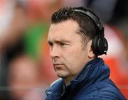 19 June 2011; Former Armagh footballer Oisin McConville, in his role with BBC, watches on during the game. Ulster GAA Football Senior Championship Semi-Final, Derry v Armagh, St Tiernach's Park, Clones, Co. Monaghan. Picture credit: Stephen McCarthy / SPORTSFILE