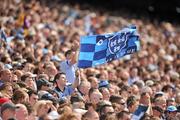 26 June 2011; A Dublin supporter waves a flag during the game. Leinster GAA Football Senior Championship Semi-Final, Dublin v Kildare, Croke Park, Dublin. Picture credit: David Maher / SPORTSFILE