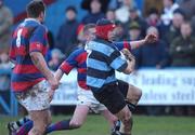 9 February 2002; Colm McMaohn of Shannon is tackled by Ben Gissing, left, and team-mate Mike Walls, both of Clontarf during the AIB All-Ireland League Division 1 match between Clontarf and Shannon at Castle Avenue in Clontarf, Dublin. Photo by Aoife Rice/Sportsfile