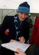 10 February 2002; Anthony Meredith, a member of Ballymun Kickhams, signs The Dublin GAA Supporters' Club Petition, which states their opposition to The GAA Strategic Review Commitee's proposal to establish 2 Senior Football Teams and 2 County Boards within Dublin and calls for the proposal to be withdrawn immediately, ahead of the Allianz National Football League Division 1A Round 1 match between Dublin and Donegal at Parnell Park in Dublin. Photo by Ray McManus/Sportsfile