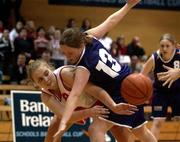 11 February 2002; Laura McDowell of St Catherine's in action against Samantha Kennedy of Cabinteely during the Bank of Ireland Schools Cup U16 &quot;C&quot; Girls Final match between Cabinteely Community School, Dublin, and St Catherine's Vocational school, Killybegs, Donegal, at the ESB Arena in Tallaght, Dublin. Photo by Brendan Moran/Sportsfile