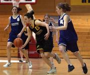 12 February 2002; Caoimhe Clancy of St Paul's, in action against Katie Sweeney of Colaiste Dun Iascaigh during the Bank of Ireland Schools Cup U19 &quot;B&quot; Girls Final match between Colaiste Dun Iascaigh, Cahir, Tipperary and St Paul's Secondary School, Oughterard, Galway, at the ESB Arena in Tallaght, Dublin. Photo by Brendan Moran/Sportsfile