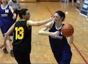 12 February 2002; Rosie Tobin of Colaiste Dun Iascaigh in action against Caoimhe Clancy of St Paul's during the Bank of Ireland Schools Cup U19 &quot;B&quot; Girls Final match between Colaiste Dun Iascaigh, Cahir, Tipperary and St Paul's Secondary School, Oughterard, Galway, at the ESB Arena in Tallaght, Dublin. Photo by Brendan Moran/Sportsfile