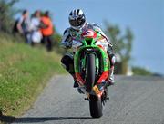 1 July 2011; Michael Dunlop, Ballymoney, Co. Antrim, pulls a wheelie over Gillies Leap, on board his 1000cc Kawasaki ZX10R, during a practice session. AON Bikecare Skerries 100 Road Race, Practice Day, Skerries, Dublin. Picture credit: Barry Cregg / SPORTSFILE