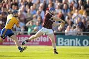 2 July 2011; Damien Hayes, Galway, shoots to score his side's first goal, despite the attention of Conor Cooney, Clare. GAA Hurling All-Ireland Senior Championship, Phase 2, Galway v Clare, Pearse Stadium, Salthill, Galway. Picture credit: Stephen McCarthy / SPORTSFILE