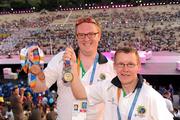 4 July 2011; Team Ireland's Jonathan Deering, left, Dunlavin, Co. Wicklow, dounle Bronze Medal winner in Badminton and Men's 5-a-side soccer Gold Medal winner Paul Kenny, Tinahely, Co. Wicklow, at the closing ceremony. 2011 Special Olympics World Summer Games, Closing Ceremony, Panathenaikon Stadium, Athens, Greece. Picture credit: Ray McManus / SPORTSFILE