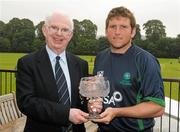 5 July 2011; Ireland's Gary Wilson receives a presentation from Dr. Murray Power, President of the Northern Cricket Union, to mark his 100th cap for Ireland. One Day International, Ireland v Namibia, Stormont, Belfast, Co. Antrim. Photo by Sportsfile