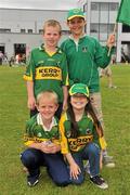3 July 2011; Kerry supporters Kieran Swann, aged 8, top left, Michael Sheehan, aged 11, top right, Aidan Swann, aged 7, bottom left, and Monica Sheehan, aged 7, from Moyvane, Co. Kerry. Munster GAA Football Senior Championship Final, Kerry v Cork, Fitzgerald Stadium, Killarney, Co. Kerry. Picture credit: Diarmuid Greene / SPORTSFILE