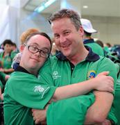 5 July 2011; Team Ireland, sponsored by eircom, returned with 107 medals from the 2011 Special Olympics World Summer Games in Athens. In total 126 athletes from Ireland competed in these prestigious World level Games which took place in Athens from 25th June - 4th July. Pictured as they depart for Dublin Airport are Team Ireland's Gary McCabe, Clara, Co. Offaly and coach Tommy Canavan. Athens Airport, Greece. Picture credit: Ray McManus / SPORTSFILE