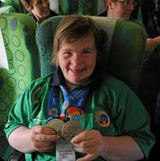 5 July 2011; Team Ireland, sponsored by eircom, returned with 107 medals from the 2011 Special Olympics World Summer Games in Athens. In total 126 athletes from Ireland competed in these prestigious World level Games which took place in Athens from 25th June - 4th July. Pictured on the flight back home to Dublin Airport is Team Ireland's Deirdre Gannon, Westport, Co. Mayo. Picture credit: Ray McManus / SPORTSFILE