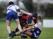7 February 2017; Jamie Kavanagh of Wesley College is tackled by Alex Deegan, left and Daniel Molloy of St Andrew’s College during the Bank of Ireland Leinster Schools Junior Cup Round 1 match between Wesley College and St Andrew’s College at Anglesea Road in Dublin. Photo by Sam Barnes/Sportsfile