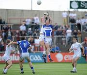 9 July 2011; Padraig Clancy, Laois, in action against Hugh Lynch, Kildare. GAA Football All-Ireland Senior Championship Qualifier Round 2, Laois v Kildare, O'Moore Park, Portlaoise, Co. Laois. Picture credit: Matt Browne / SPORTSFILE