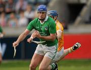 9 July 2011; Brian Geary, Limerick, in action against Colm Mcfall, Antrim. GAA Hurling All-Ireland Senior Championship Phase 3, Antrim v Limerick, Parnell Park, Dublin. Picture credit: Ray McManus / SPORTSFILE