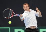 10 July 2011; Conor Niland, Ireland, in action during his match against Malek Jaziri, Tunisia. Davis Cup Europe/Africa Zone Group II Day 3, Conor Niland, Ireland v Malek Jaziri, Tunisia, David Lloyd Riverview, Clonskeagh, Dublin. Picture credit: Pat Murphy / SPORTSFILE