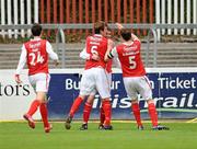 10 July 2011; Derek Doyle, St Patrick's Athletic, celebrates with team-mates Ian Daly, left, Shane McFaul, centre, and Evan McMillan after scoring his side's first goal. Airtricity League Premier Division, St Patrick's Athletic v Dundalk, Richmond Park, Inchicore, Dublin. Picture credit: Barry Cregg / SPORTSFILE