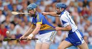 10 July 2011; John O'Brien, Tipperary, in action against Michael Walsh, Waterford. Munster GAA Hurling Senior Championship Final, Waterford v Tipperary, Pairc Ui Chaoimh, Cork. Picture credit: Stephen McCarthy / SPORTSFILE