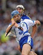 10 July 2011; Michael Walsh, Waterford, tries to clear under pressure from Patrick Maher, Tipperary. Munster GAA Hurling Senior Championship Final, Waterford v Tipperary, Pairc Ui Chaoimh, Cork. Picture credit: Ray McManus / SPORTSFILE