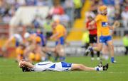 10 July 2011; Jamie Barron, Waterford, shows his disappointment after defeat to Clare. Munster GAA Hurling Minor Championship Final, Clare v Waterford, Pairc Ui Chaoimh, Cork. Picture credit: Diarmuid Greene / SPORTSFILE