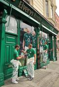 12 July 2011; Ireland rugby stars Fergus McFadden, left, Jamie Heaslip and Sean Cronin are pictured painting the Elverys Sports store Dawson St, Dublin, green in preparation for the warm up games in August ahead of the Rugby World Cup in September and October next. Ireland Rugby Team Go All Green, Elverys Sports, Dawson Street, Dublin. Picture credit: Brendan Moran / SPORTSFILE