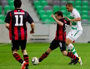 14 July 2011; Christopher Fagan, Bohemians, in action against Sreten Sretenovic, Olimpija Ljubljana. UEFA Europa League, Second Qualifying Round, 1st Leg, Olimpija Ljubljana v Bohemians, ŠRC Stožice, Ljubljana, Slovenia. Picture credit: Vid Ponikvar / SPORTSFILE