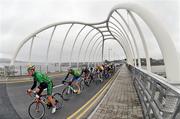 15 July 2011; Conor McIlwaine, Stena Line Ireland, leads the peloton across the Michael Davitt bridge at Achill Sound on Stage 4 of the International Junior Tour of Ireland, Stage 4, Achill - Achill. Picture credit: Stephen McMahon / SPORTSFILE