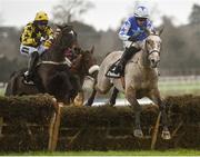 12 February 2017; Eventual winner Bacardys, left, with Patrick Mullins up, jump the last behind Bunk Off Early, with Paul Townend up, who finished second during the Deloitte Novice Hurdle on Bacardys at Leopardstown. Leopardstown, Co. Dublin.  Photo by Cody Glenn/Sportsfile