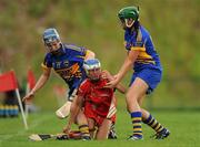 16 July 2011; Jennifer O'Leary, Cork, in action against Clodagh Quirke, left, and Cora Hennessy, Tipperary. All-Ireland Senior Camogie Championship in association with RTE Sport, Cork v Tipperary, Cork Institute of Technology, Bishopstown, Cork. Picture credit: Barry Cregg / SPORTSFILE