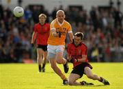 16 July 2011; Mark Poland, Down, in action against Anto Healy, Antrim. GAA Football All-Ireland Senior Championship Qualifier, Round 3, Antrim v Down, Casement Park, Belfast, Co. Antrim. Picture credit: Oliver McVeigh / SPORTSFILE